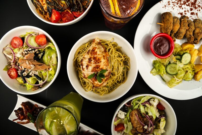 various types of salads and dishes on the table top view